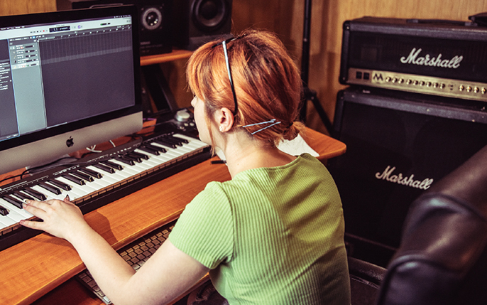 Music tech student playing the keyboard