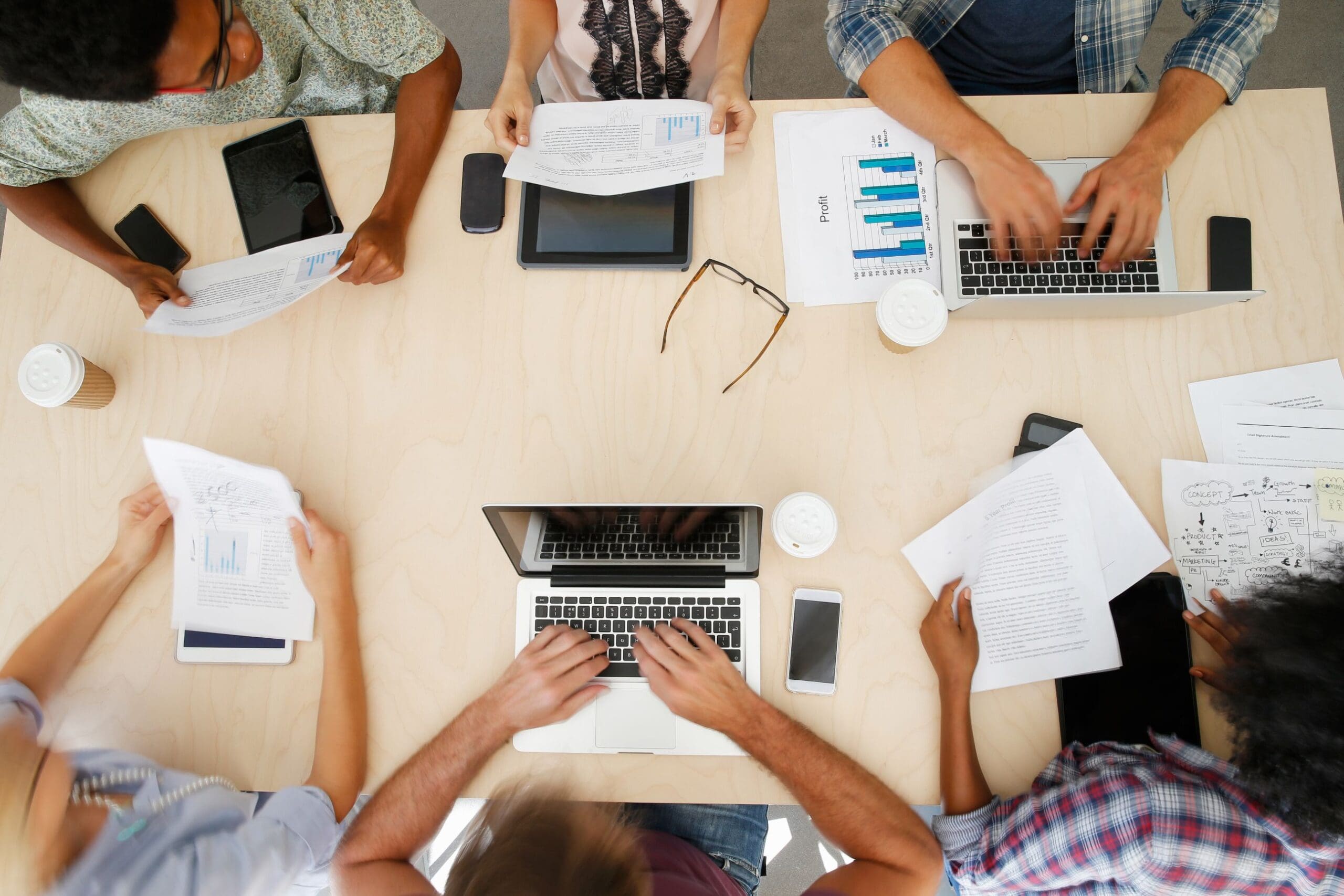 Office staff working together in meeting