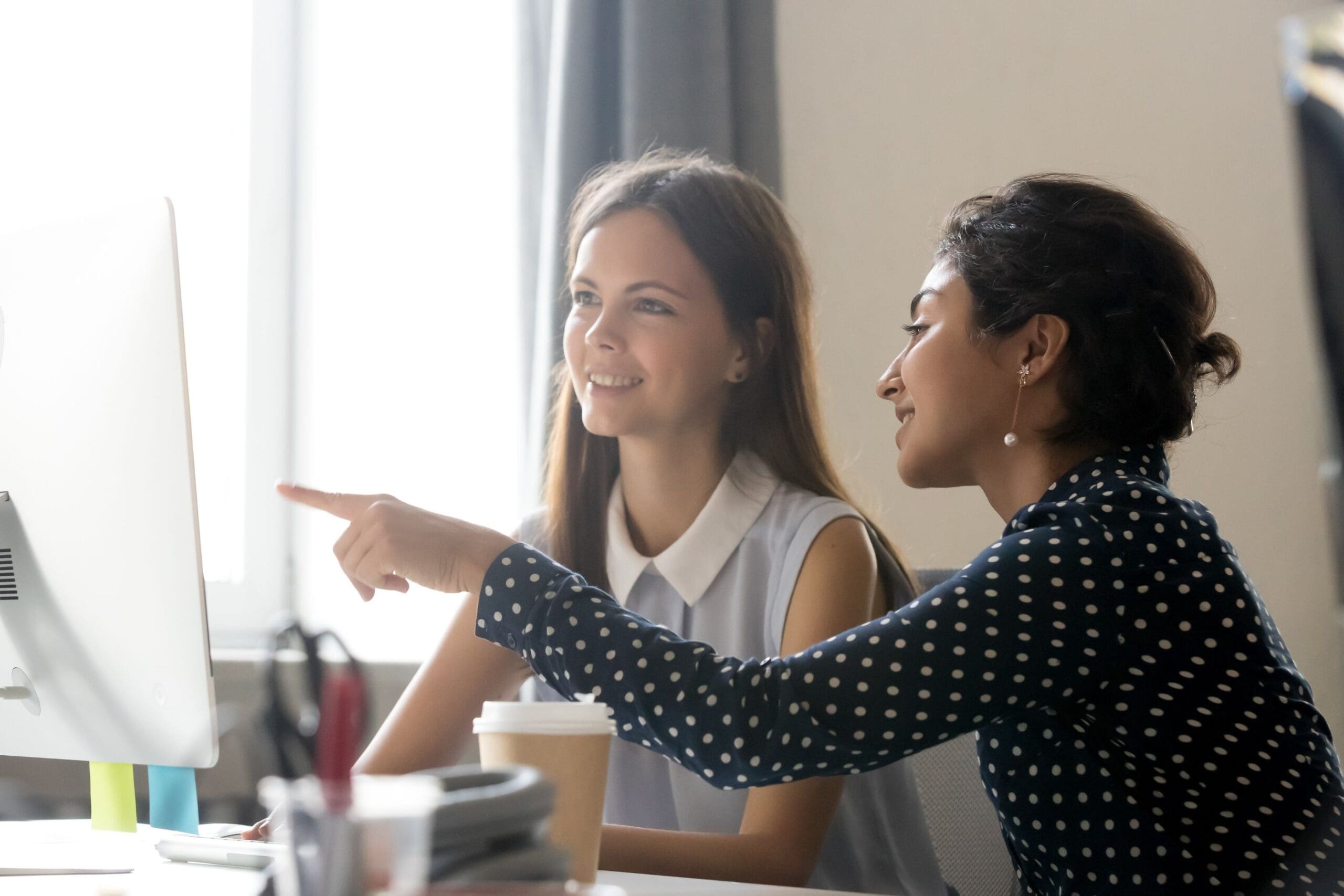 Intern receiving training from manager