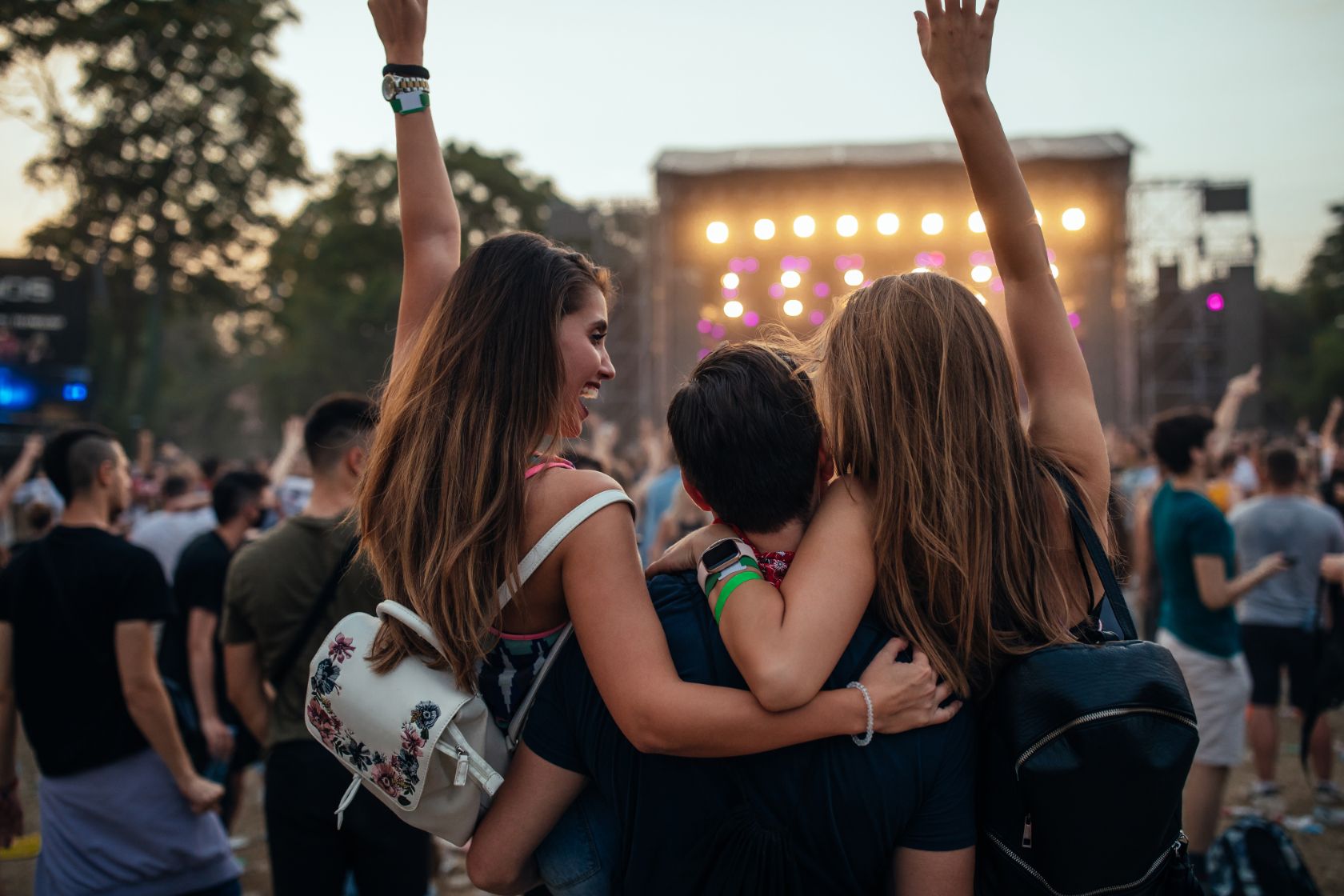 Friends enjoying music festival together