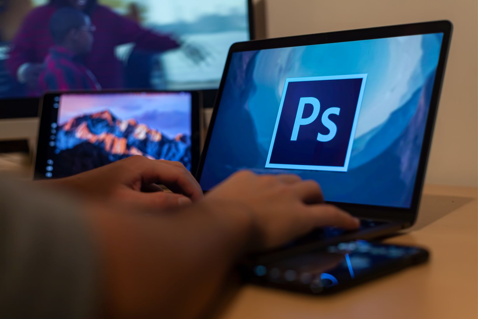 Person working on Adobe Photoshop