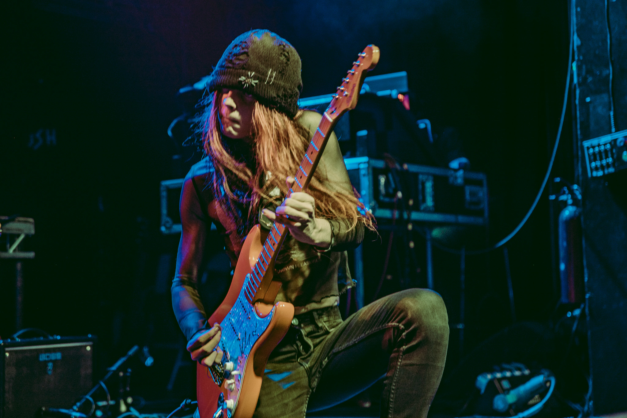 Guitarist performing on stage in Manchester