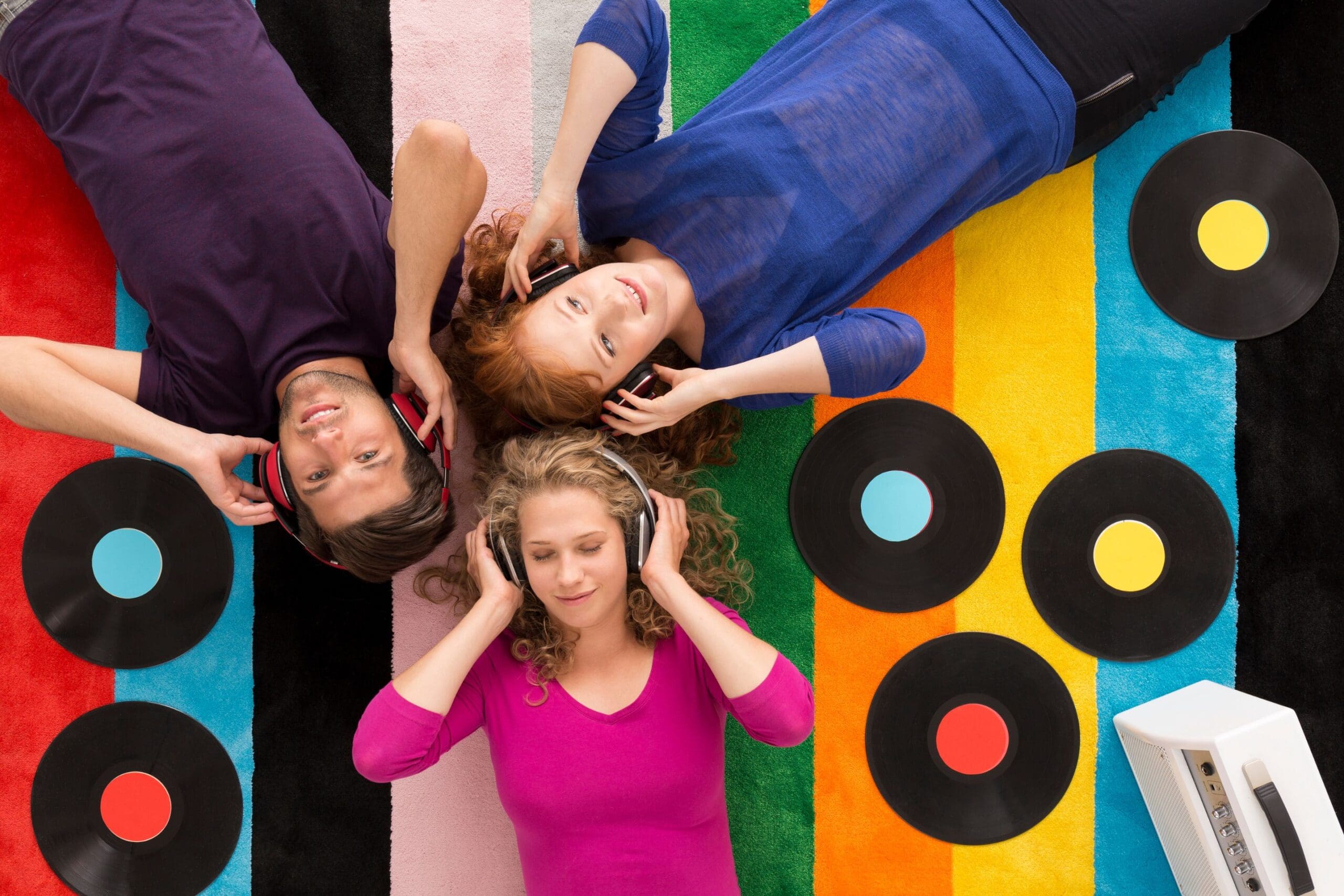 Group listening to music on headphones