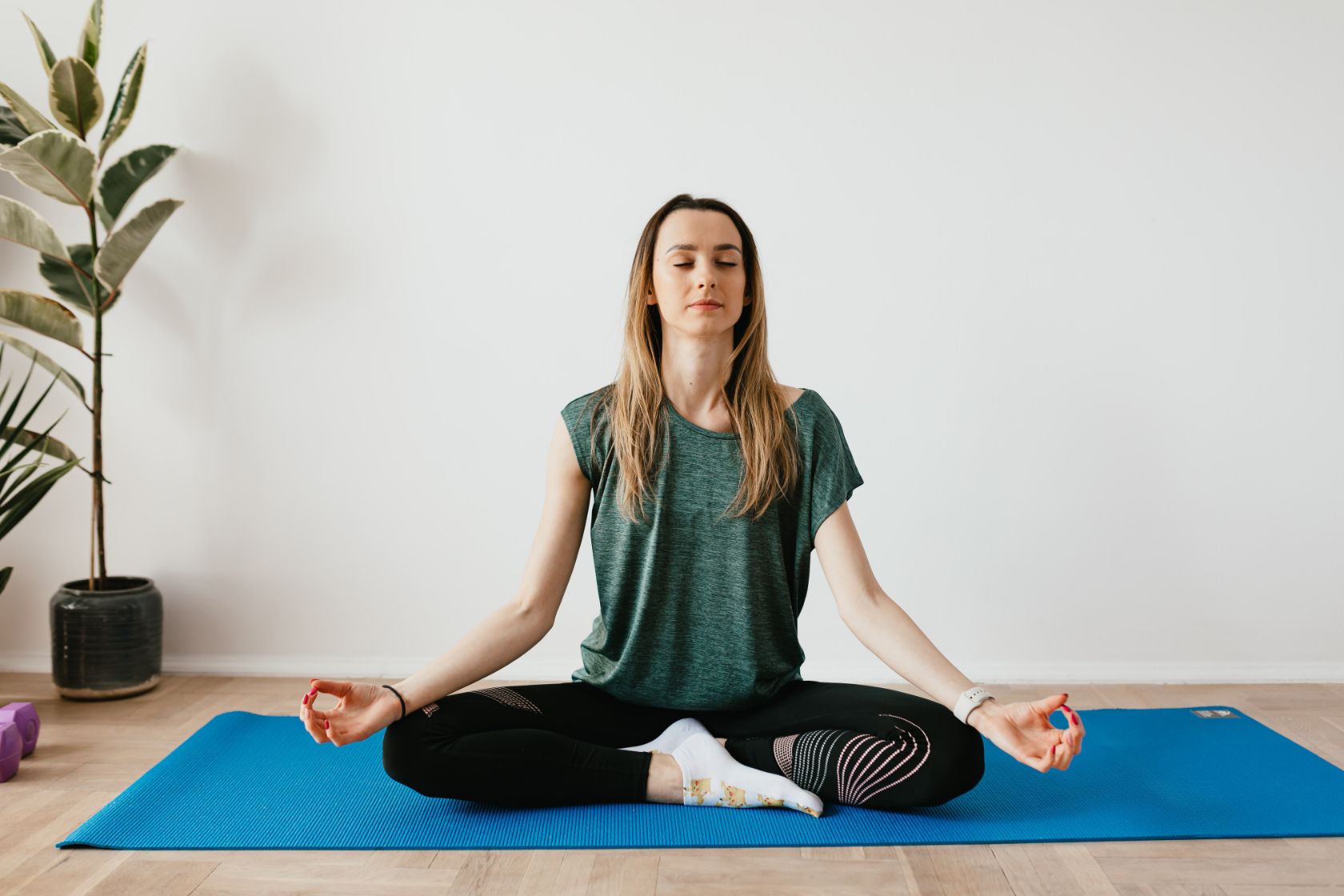 Female content creator meditating