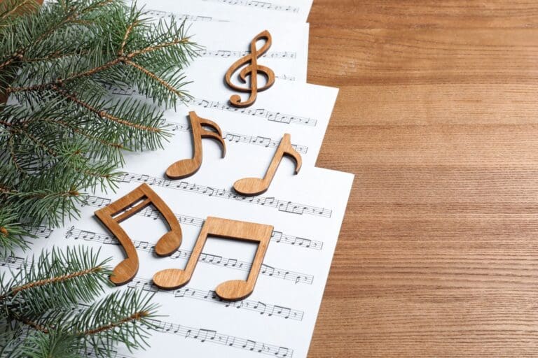 Music composition sheet with Christmas tree